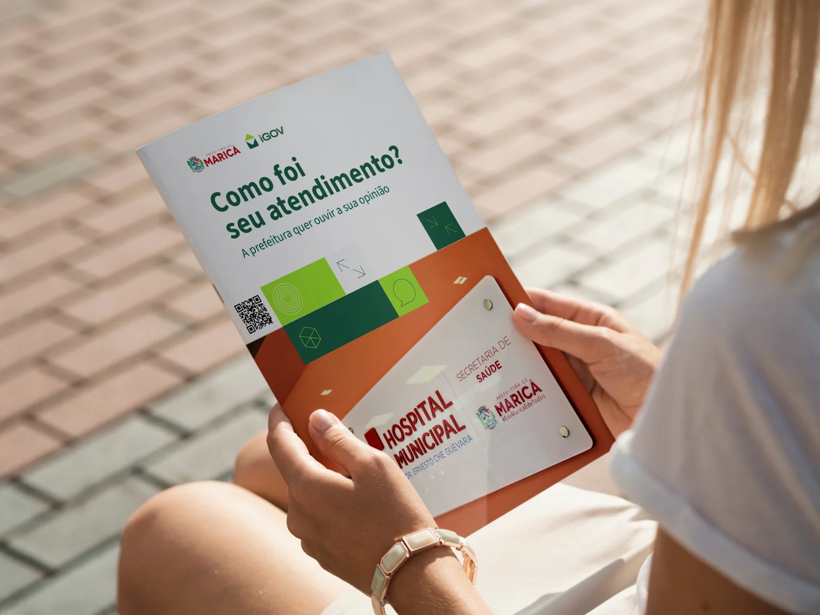 Material conceitual com QR code para avalia&ccedil;&atilde;o de atendimento